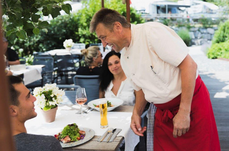 Chef Heinz serves guests personally