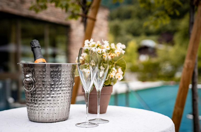 End the evening by the pool with a glass of wine